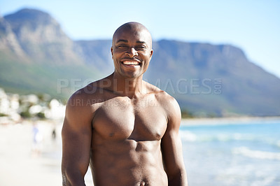 Buy stock photo Portrait of black man on beach, vacation and smile with nature, sunshine and outdoor island travel. Sea, mountain and happy person on ocean holiday in summer with tropical adventure, peace and waves