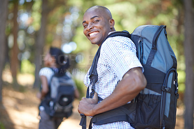 Buy stock photo Portrait, smile and black man hiking in the forest together with his wife for travel, freedom or adventure. Earth, nature or environment with a happy husband in the woods to explore the wilderness