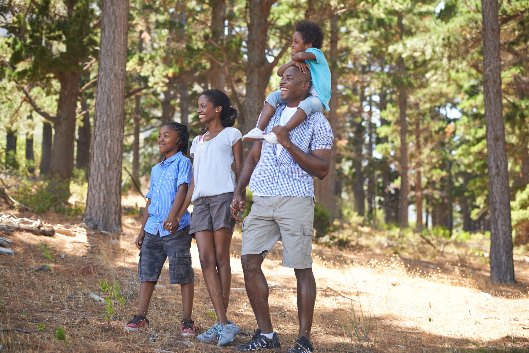 Buy stock photo Happy, walking or black family hiking in forest to relax or bond on holiday vacation together in nature. Children siblings, mother or African father in woods trekking on outdoor adventure with smile