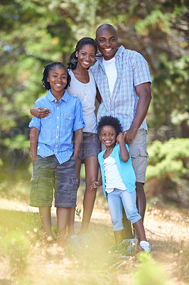 Buy stock photo Happy, portrait or black family hiking in forest to relax or bond on holiday vacation together in nature. Children siblings, mother or African father in woods trekking on outdoor adventure with smile