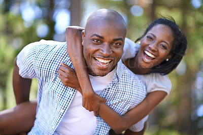 Buy stock photo Piggyback, portrait or happy black couple in forest to relax or bond on holiday vacation together in nature. Hiking, travel or African woman with smile, love or man in woods on outdoor park adventure