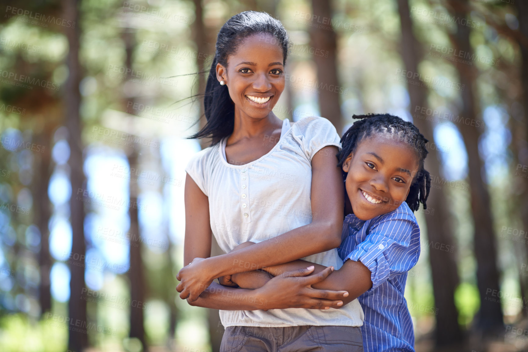 Buy stock photo Portrait, mother and son hiking in nature together for travel, freedom or adventure while hugging. Black family, love or environment with a happy young woman and boy child embracing in the woods