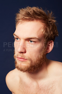 Buy stock photo Cropped view of a young man looking away