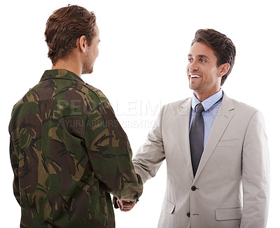 Buy stock photo Shot of a young man in military fatigues