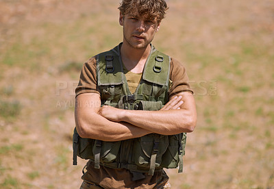 Buy stock photo Military, arms crossed and portrait of man in nature for war, conflict and patriotism. Army, surveillance and security with person training on field for soldier, battlefield and veteran protection