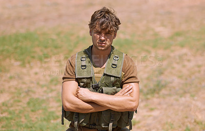 Buy stock photo Army, arms crossed and portrait of man in nature for war, conflict and patriotism. Military, surveillance and security with person training on field for soldier, battlefield and veteran protection