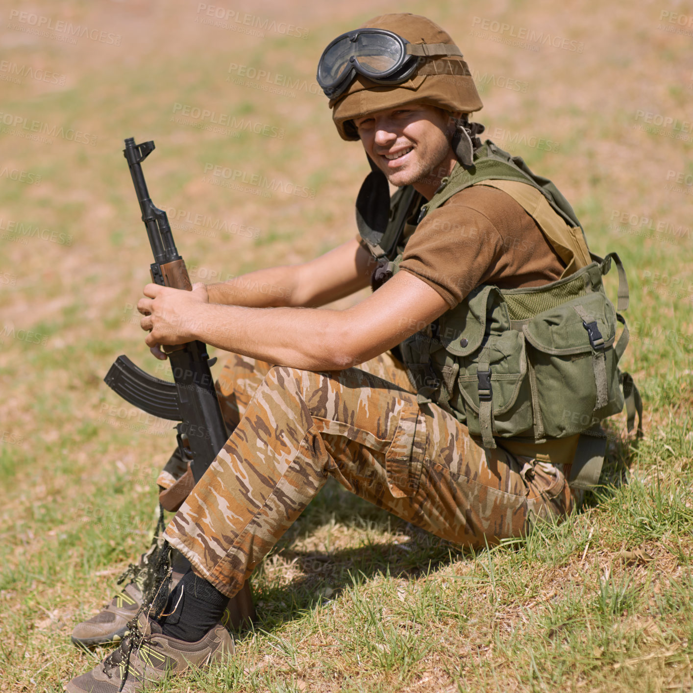 Buy stock photo Military, smile and training with man and gun in nature for war, conflict and patriotism. Army, surveillance and security rifle with person and relax on grass for soldier, battlefield and veteran