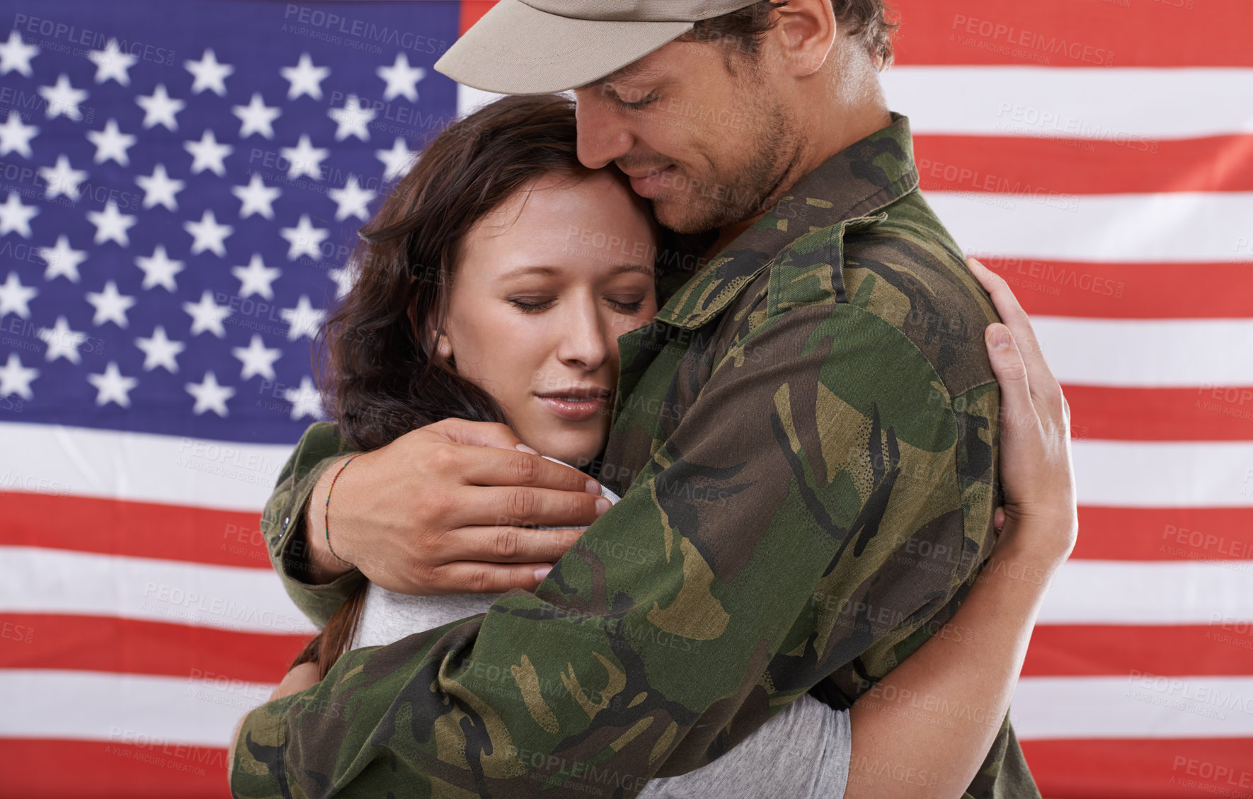 Buy stock photo American soldier hug woman, reunion after war and welcome hero with love and flag. Army man reunite with partner, military veteran in uniform for homecoming with happiness, bond and affection