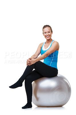 Buy stock photo Portrait of a smiling woman sitting on her exercise ball