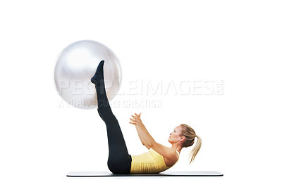 Buy stock photo Exercise ball, fitness and woman on a studio floor for legs, strength or training challenge on white background. Gym, mockup and female athlete with inflatable for ground, workout or flexibility 