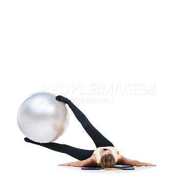Buy stock photo Woman, ball or strong legs on a white background space for workout, wellness or mobility exercise. Female athlete training, challenge or fitness for mockup, stretching or body flexibility in studio