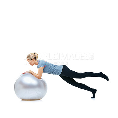 Buy stock photo Woman, gym ball or balance in studio for workout, wellness or mobility exercise on white background. Female athlete, training equipment or fitness for mockup space, stretching legs or flexibility