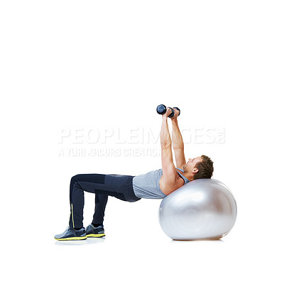 Buy stock photo Fitness, exercise ball or man with dumbbell in studio for abs, core or balance challenge on white background. Workout, weightlifting or male bodybuilder with inflatable for wellness or sports routine