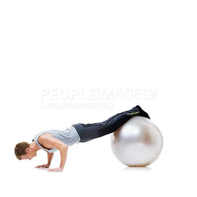 Buy stock photo Man, push ups and exercise ball for fitness, workout or health and wellness against a white studio background. Active male person or athlete on round object for training or pilates on mockup space