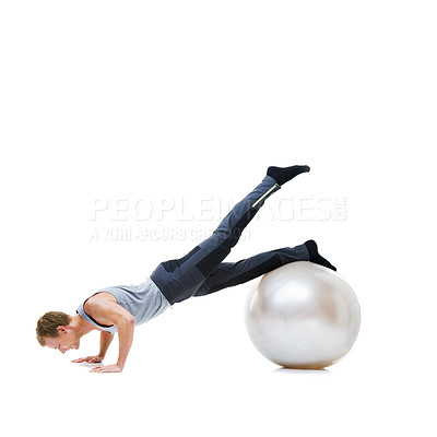 Buy stock photo Man, push ups and balance on exercise ball for fitness, workout or health and wellness on a white studio background. Active male person or athlete on round object, training or pilates on mockup space