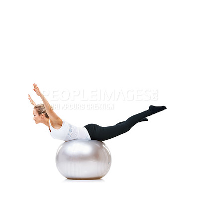 Buy stock photo Woman, ball or balance on studio space for workout, wellness or mobility exercise on white background. Female athlete, training equipment or fitness for mockup, stretching legs or body flexibility