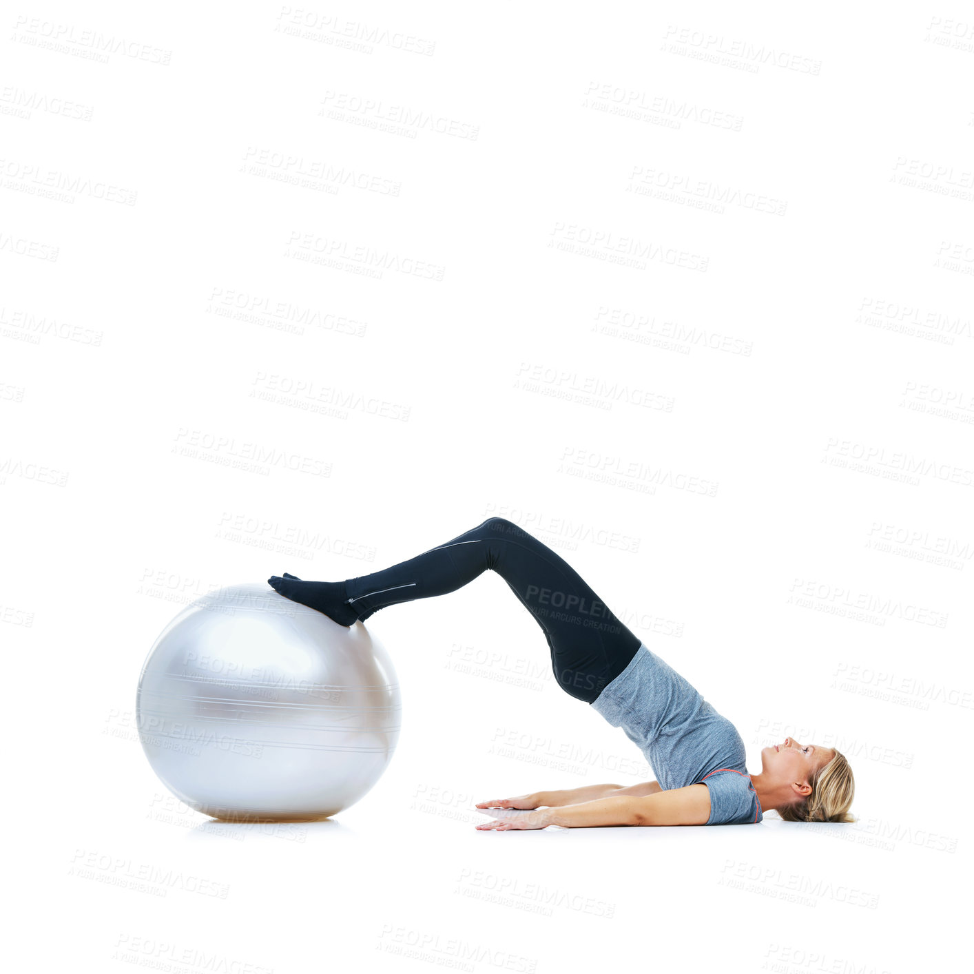 Buy stock photo Woman, ball or balance on a white background for workout, wellness or mobility exercise on studio space. Female athlete, training equipment or fitness for mockup, stretching legs or body flexibility