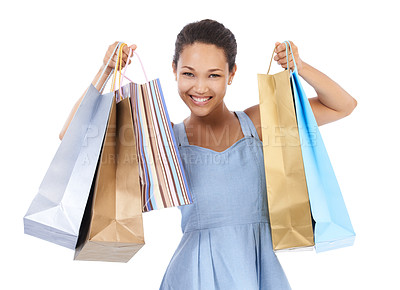 Buy stock photo Excited woman, portrait and shopping bag for discount, sale and retail giveaway in commerce on a white background. Fashion winner, customer or happy african person with gift or winning deal in studio