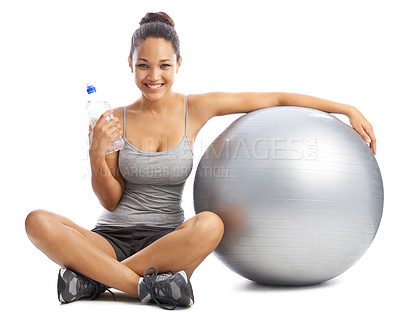 Buy stock photo Happy woman, portrait and water by exercise ball for workout or training against a white studio background. Female person smile with bottle or natural mineral drink for fitness or hydration on mockup