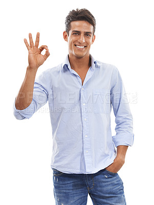 Buy stock photo Success, okay sign and happy man in portrait for thank you, support or like on a white background. Young person or model in shirt and jeans with great, yes and excellence emoji or hand in studio