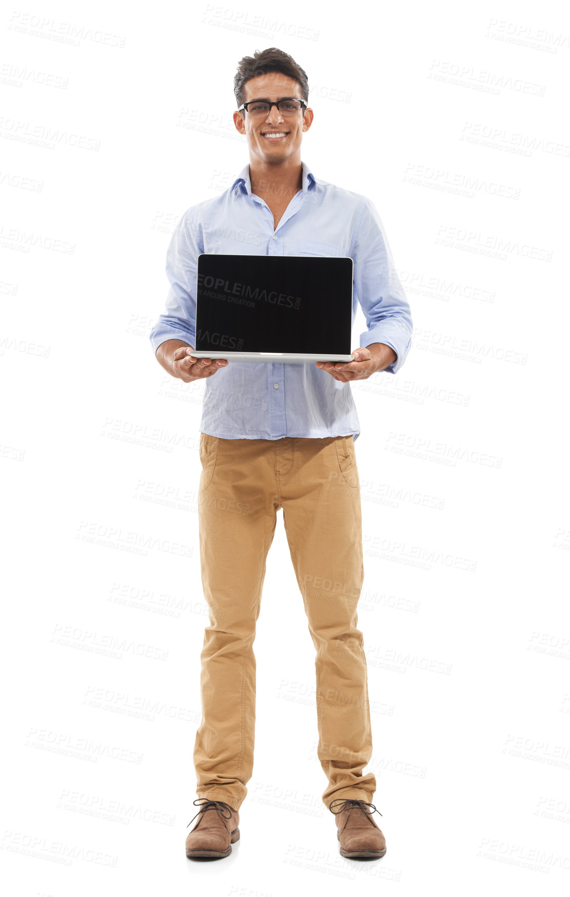 Buy stock photo Full body portrait of a handsome young man happily displaying a laptop