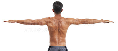Buy stock photo Rearview of a shirtless muscular man standing with arms outstretched against a white background