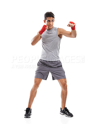 Buy stock photo Boxer, man and kickboxing in studio with sports for fitness, health and martial arts isolated on white background. Strong athlete with muscle, action and fighting with MMA training and exercise 