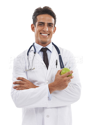 Buy stock photo Doctor, portrait and man smiling with apple in studio, nutrition and healthy diet or fiber in fruit. Male medical professional, healthcare and promotion of organic snack, face and white background