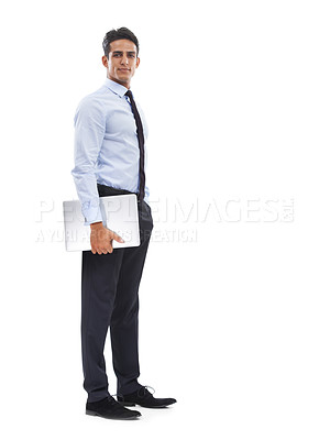 Buy stock photo Portrait of handsome young businessman standing with lap top in his hand against a white background