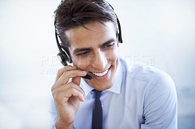 Buy stock photo Call center, man and smile in studio for customer service, CRM questions and IT support on white background. Happy telemarketing salesman thinking of telecom advisory, microphone and contact for FAQ