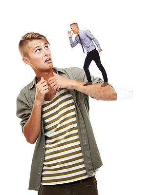 Buy stock photo Listening, ego and a man on a white background with a person for horror, scared and alarmed. Young, expression and a guy with danger, terrified or afraid of a male on shoulder on a studio backdrop