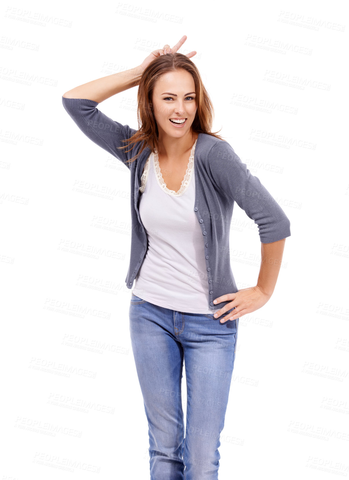 Buy stock photo Woman with smile in portrait, bunny ears hand gesture and happy in studio, goofy or silly on white background. Model in casual clothes, fun with emoji or peace sign above head, comic and playful