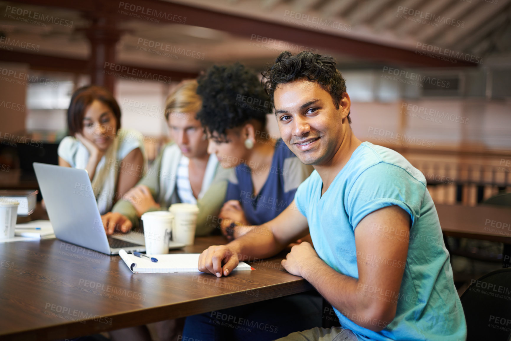 Buy stock photo Happy man, laptop or portrait of students studying for school, university library or college campus education. Diversity, elearning or group of people with notes, teamwork or online course research