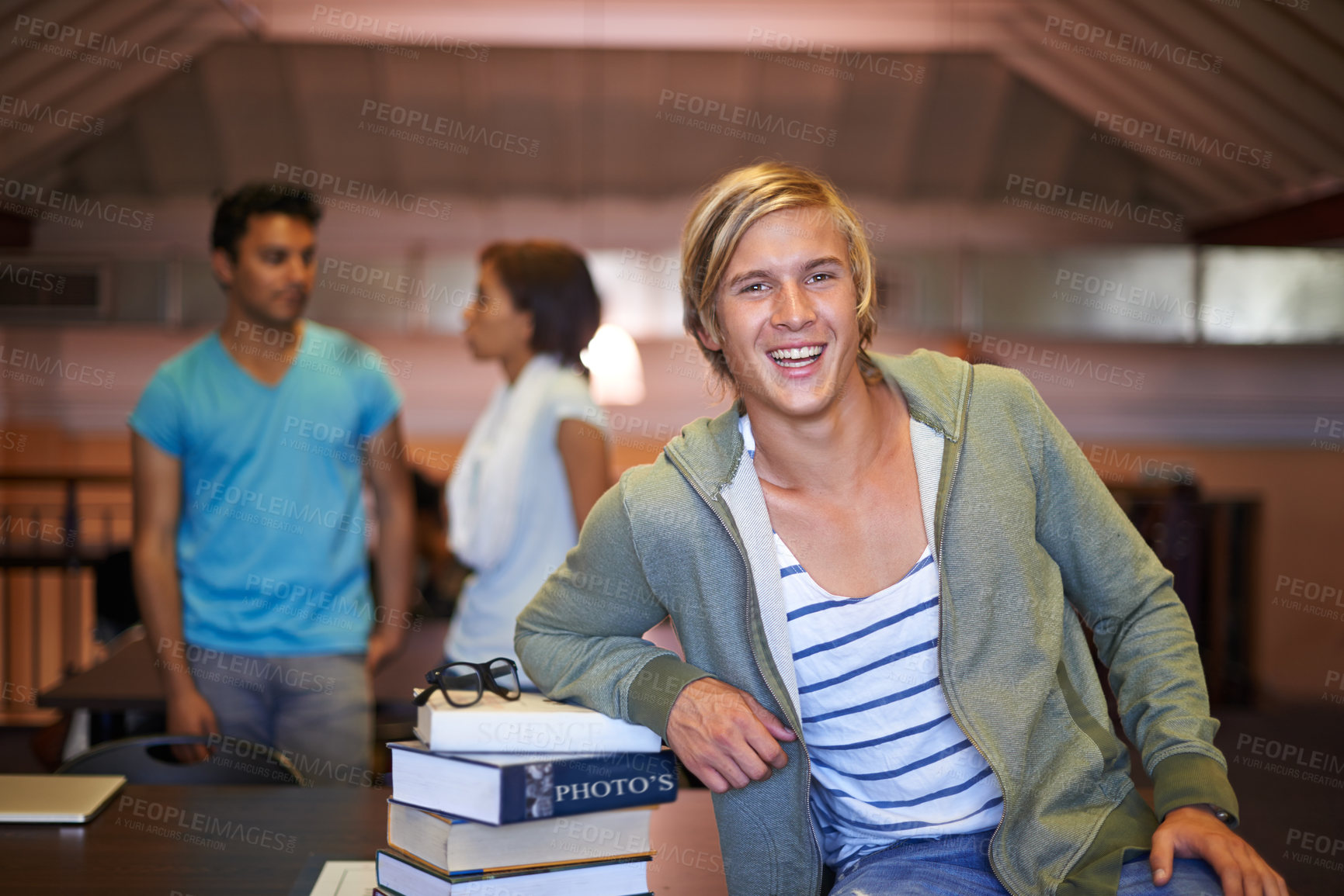Buy stock photo Portrait, confident or happy man in a library for knowledge or school development for future. Scholarship, education or male student with smile or books for studying or learning in college campus