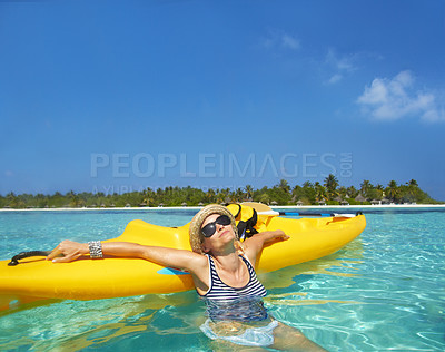 Buy stock photo Woman, kayak and tropical sea in summer with sunglasses, mockup space and blue sky background by island. Person, boat or ship for transport, holiday or travel on vacation in sunshine, water or ocean