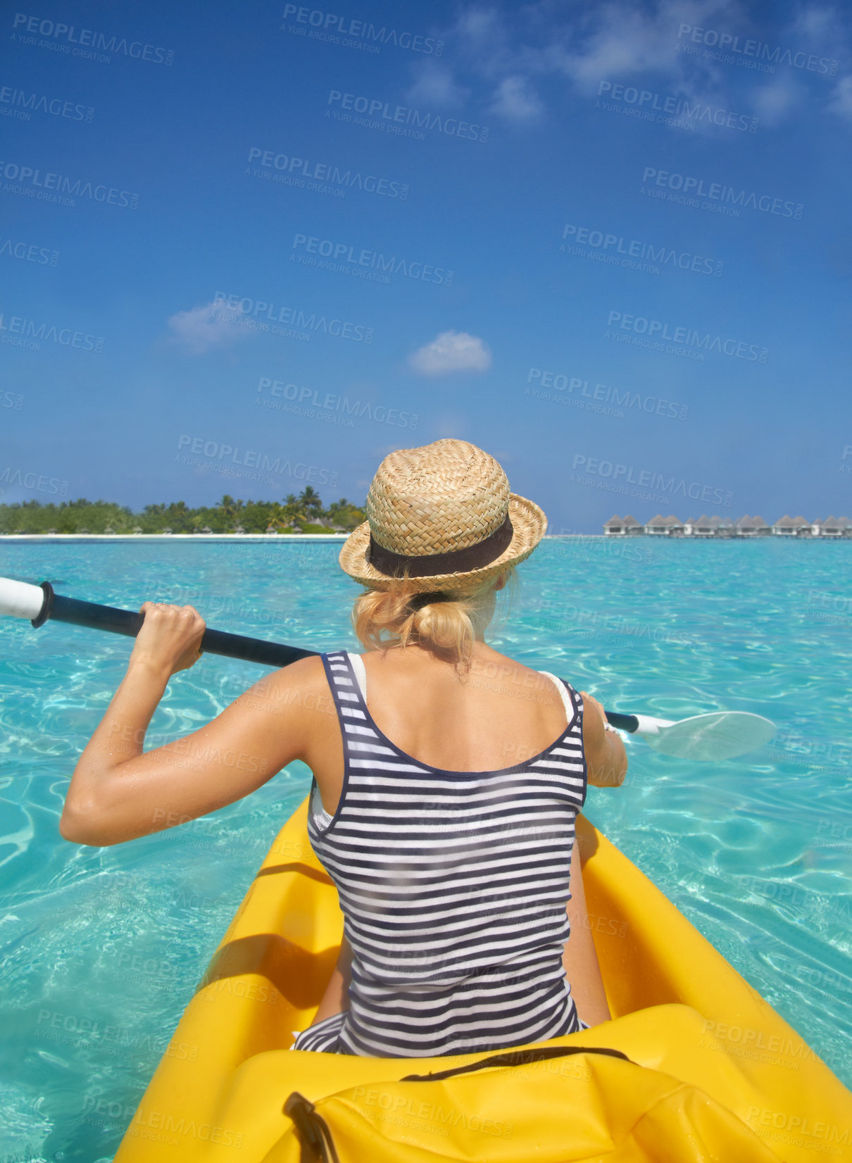 Buy stock photo Woman, kayak and tropical ocean in summer in hat, mockup space or blue sky background by island. Person, boat or back for transport, holiday or travel on vacation in sunshine, water or sea for rowing