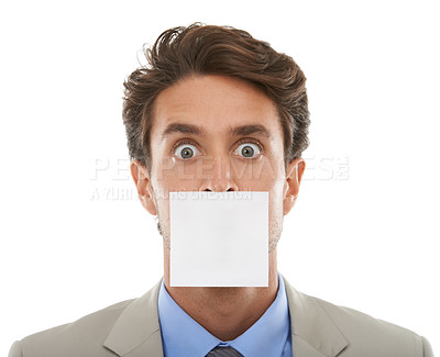 Buy stock photo Business, man and sticky note on mouth in studio with surprise, shocked or wow for secret or announcement. Entrepreneur, paper and person or face with censored, silence and victim in white background