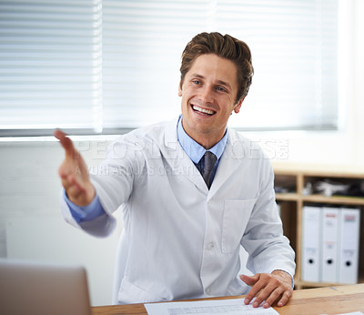 Buy stock photo Handshake, smile and man doctor in office for greeting hello at a medical consultation at clinic. Happy, professional and young male healthcare worker with shaking hand gesture in a medicare hospital
