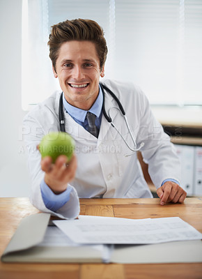 Buy stock photo Smile, apple and portrait of man doctor with stethoscope for positive, good and confident attitude. Happy, pride and young male healthcare worker with fruit in medical office of hospital or clinic.