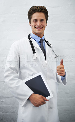 Buy stock photo Happy man, portrait and doctor with thumbs up and tablet for success in healthcare on a white studio background. Male person, surgeon or medical professional smile with like emoji, yes sign or OK
