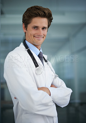 Buy stock photo Happy, crossed arms and portrait of man doctor with stethoscope for positive, good and confident attitude. Smile, pride and young male healthcare worker in medical office of hospital or clinic.