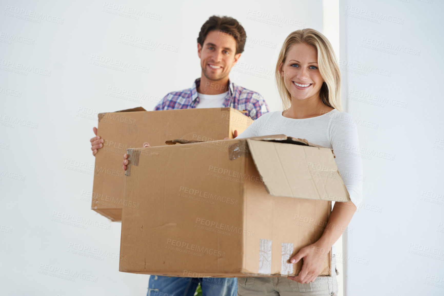 Buy stock photo Happy, boxes and portrait of couple in new home living room for unpacking and moving together. Smile, love and young man and woman from Australia with cardboard packages in home or apartment.