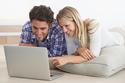 Buy stock photo Couple, happy and laptop on floor in home for movie, social media or web streaming with bonding and love. Technology, man or woman on ground with computer pc for internet scroll and tv show for care 