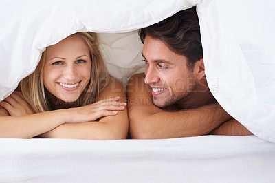 Buy stock photo Covers, portrait or happy couple in bed on holiday vacation or romantic honeymoon to celebrate marriage. Morning, love or people with smile in home, house or hotel together with duvet, bond or care