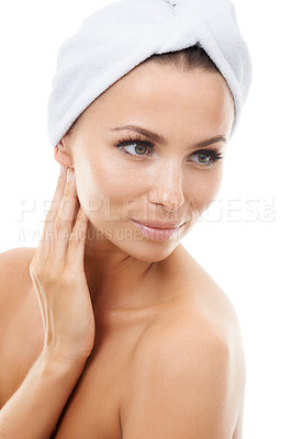 Buy stock photo Woman thinking, white background or skincare in studio for wellness with cosmetics, towel or glow. Facial dermatology, confident person or healthy model touching face or beauty results isolated alone
