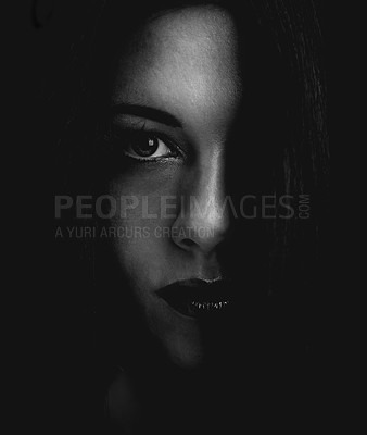 Buy stock photo Cropped dark portrait of a young woman's face