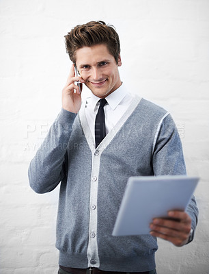 Buy stock photo Business man, phone call and tablet in portrait, smile and contact with networking by wall background. Entrepreneur, employee or person with digital touchscreen, smartphone and happy for notification