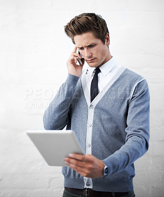 Buy stock photo Business man, phone call and tablet for reading, thinking and vision with networking by wall background. Entrepreneur, employee or person with digital touchscreen, smartphone and email notification