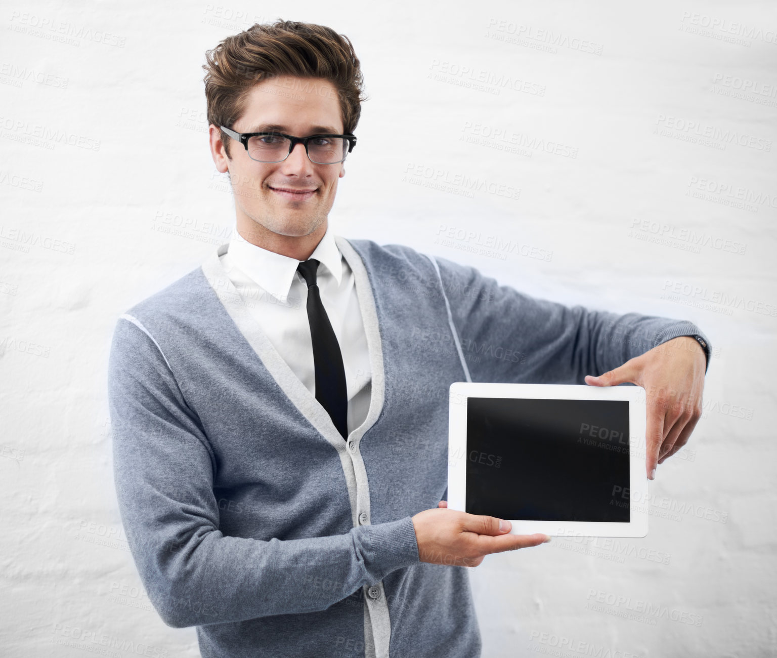 Buy stock photo Business man, tablet and screen with space, mockup and happy with presentation by wall background. Entrepreneur, digital touchscreen and promotion with ui, iot and blank for information technology