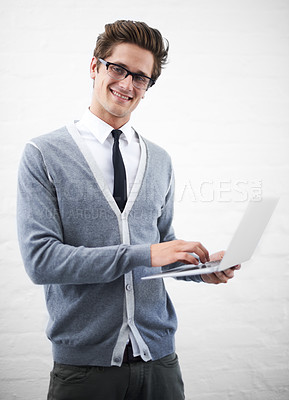 Buy stock photo Man, laptop and portrait for office job, employee and busy for software development career. Businessman, confident and person for occupation, workplace and planning for social media coding strategy
